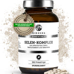 Dunkelbraunes Glas mit QIDOSHA ESSENTIALS SELEN-KOMPLEX, vegane, laborgeprüfte Selen-Tabletten aus pflanzlichen Quellen, ohne Füllstoffe, 365 Presslinge, Premiumqualität.